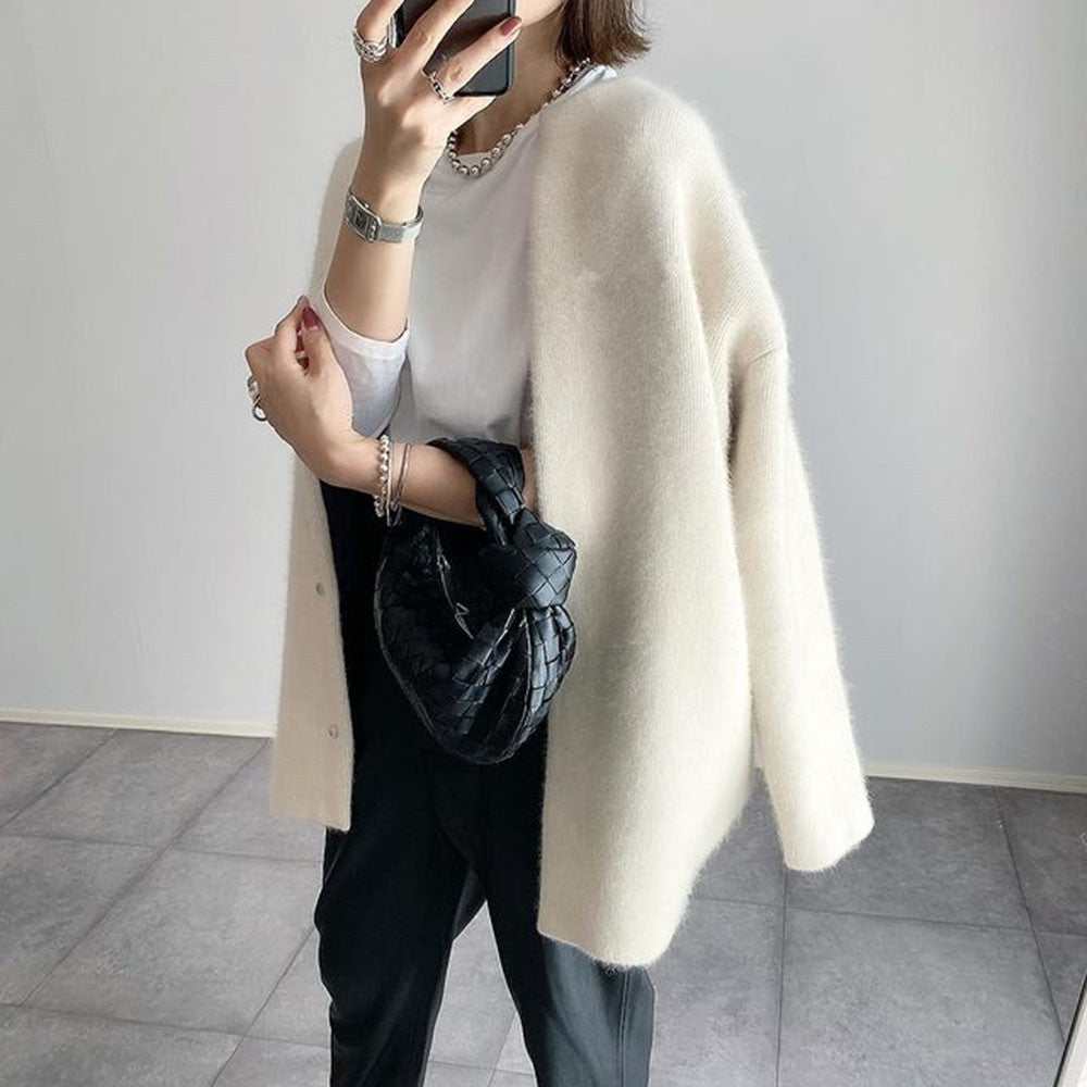Lekki kardigan damski o eleganckim, luźnym kroju