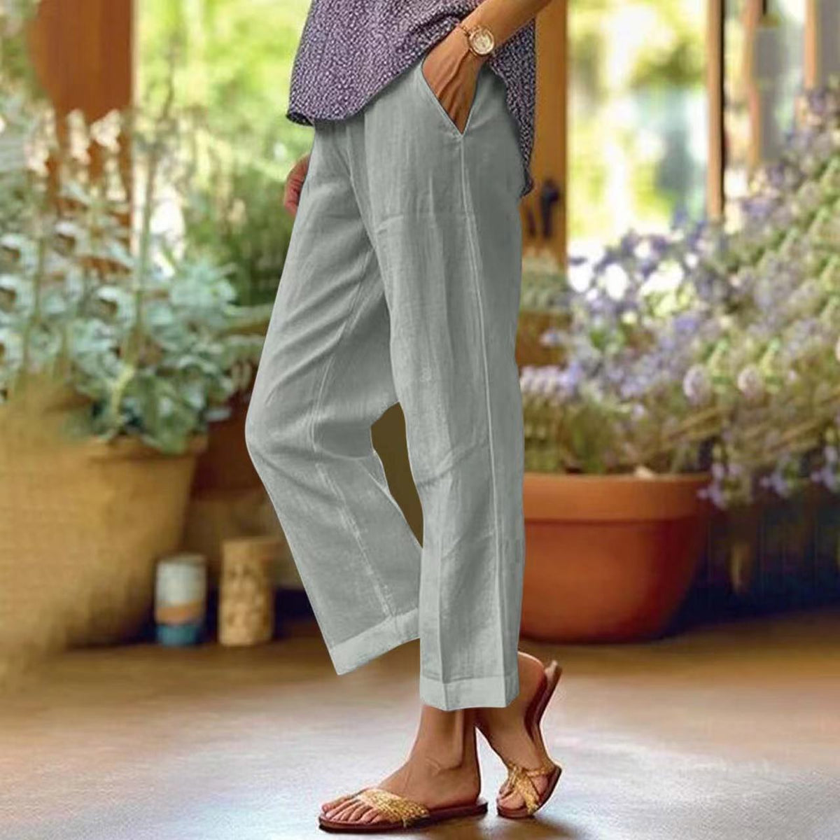 Eleganckie spodnie cropped z kontrastowym wykończeniem - Szary