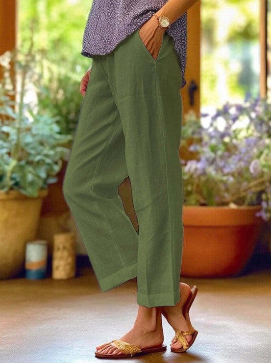 Eleganckie spodnie cropped z kontrastowym wykończeniem - Zielony