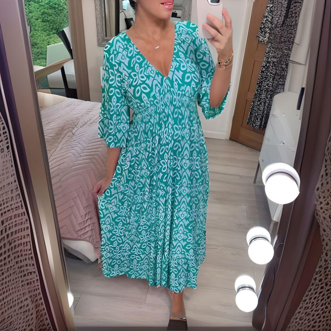 Zwiewna sukienka maxi boho z dekoltem V i etnicznym wzorem - Niebieski